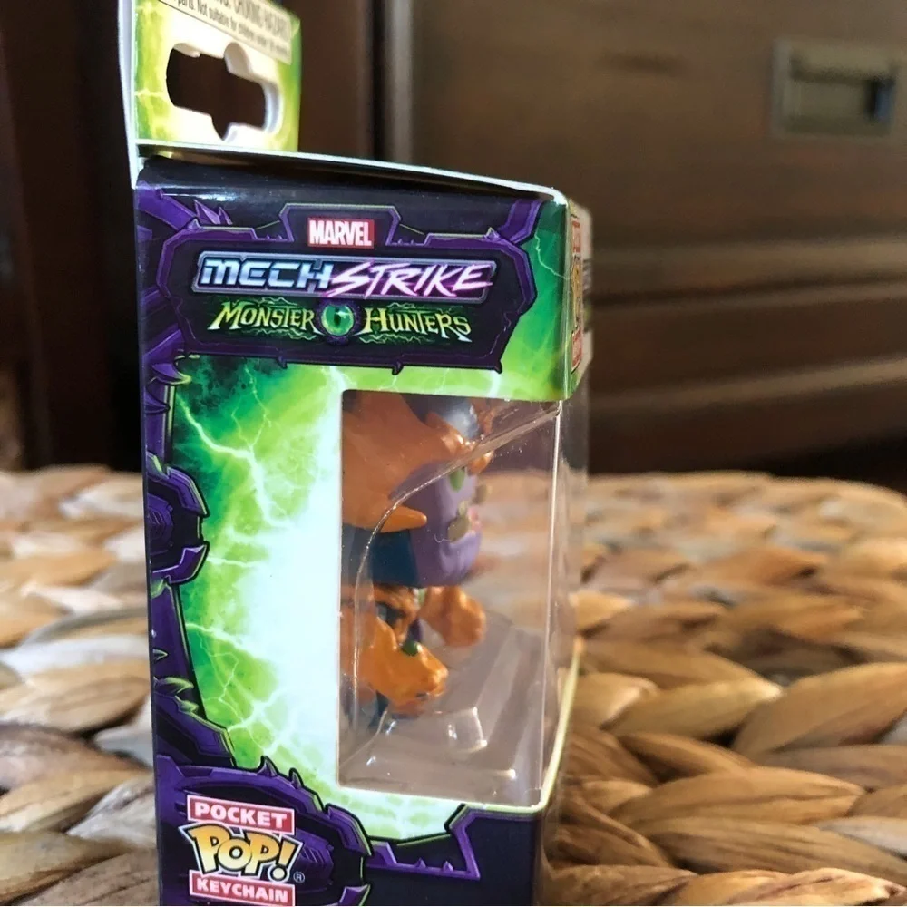 Funko Pop Marvel: Mech Strike Monster Hunters, Thanos pocket keychain